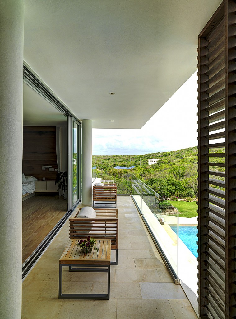 A bedroom porch with timber privacy screen 